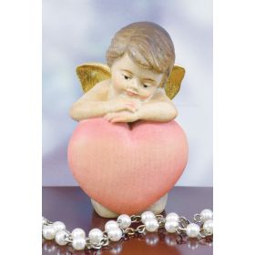 HAND CARVED ANGEL WITH A BIG HEART