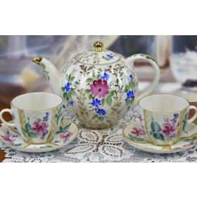 HAND PAINTED FLORAL DESIGN TEA POT, 2 CUPS, AND 2 SAUCERS